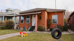 View of front of home featuring a front lawn