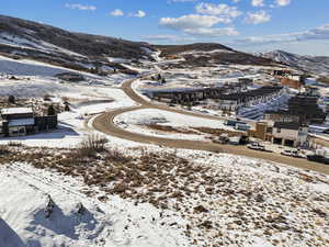 Snowy aerial view with a mountain view