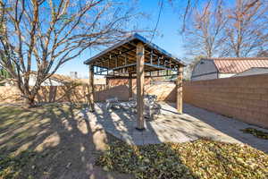 View of yard featuring a gazebo and a patio area