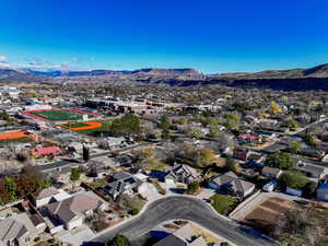 Birds eye view of property with a mountain view