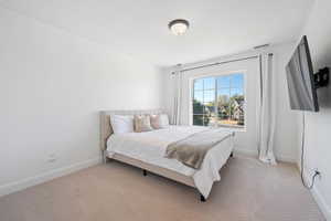 View of carpeted bedroom