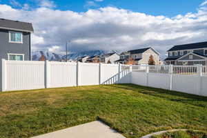 View of yard with a mountain view