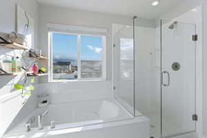 Bathroom with plus walk in shower