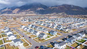 Birds eye view of property with a mountain view