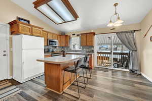 Kitchen with access to covered patio