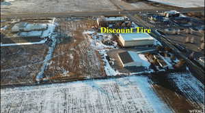 Aerial view of lot looking towards HWY 165 with neighbor to the north of lot