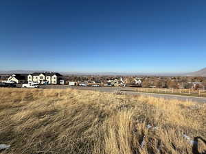 Birds eye view of property featuring a rural view