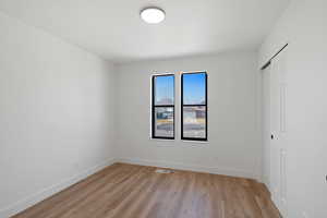 Empty room featuring light hardwood / wood-style floors