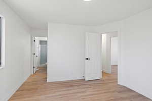 Spare room featuring light hardwood / wood-style flooring