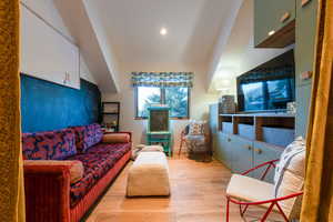 Living room featuring hardwood / wood-style flooring