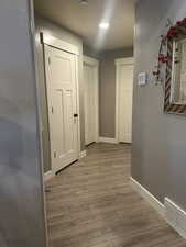 Hallway featuring light hardwood / wood-style flooring