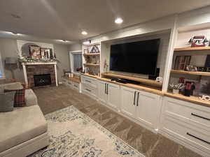 Living room featuring dark carpet