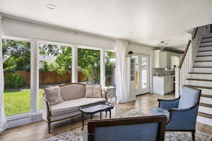 Sunroom / solarium featuring french doors