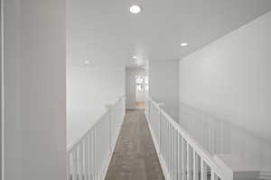 Hallway with carpet floors