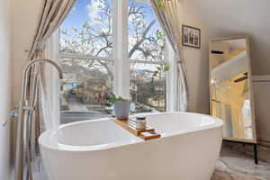 Bathroom with a bathing tub