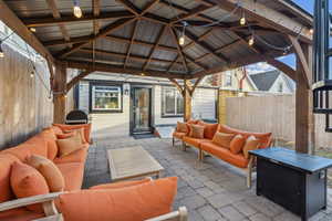 View of patio / terrace featuring a gazebo and an outdoor hangout area