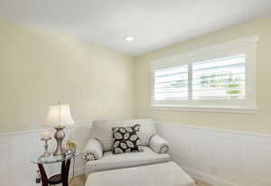 Sitting room featuring hardwood / wood-style floors