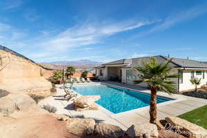 View of pool featuring a mountain view