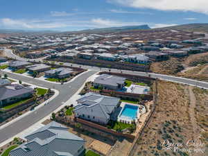 Birds eye view of property with a mountain view