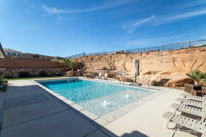 View of pool with a patio