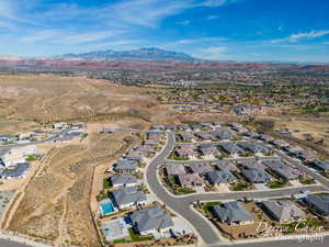 Birds eye view of property with a mountain view