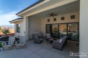 View of patio / terrace with a mountain view, ceiling fan, and an outdoor hangout area