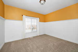 View of carpeted spare room