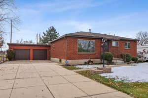 View of front of property with a garage