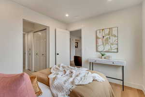 Bedroom featuring light wood-type flooring