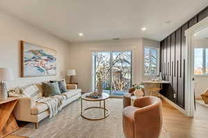 Living room with light wood-type flooring