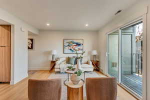 Living room featuring light wood-type flooring