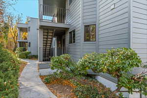 Entrance to property featuring a balcony