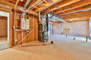 Basement featuring water heater