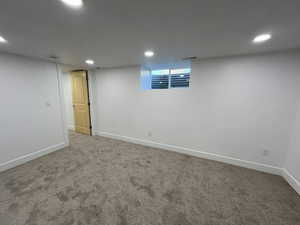 Basement with carpet