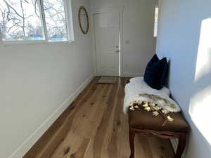 Living area featuring hardwood / wood-style floors