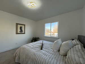 Bedroom featuring carpet floors