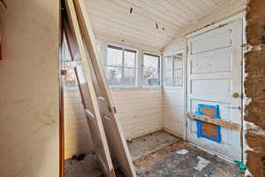 Interior space featuring vaulted ceiling