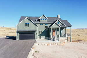 Craftsman-style house with a garage