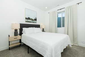 Bedroom featuring carpet floors