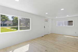 Spare room with light wood-type flooring