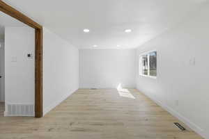 Empty room featuring light hardwood / wood-style floors