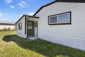 View of front of property with a front lawn