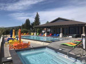 View of swimming pool featuring an outdoor hangout area and a patio