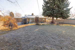 Rear view of house featuring a patio area