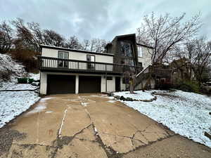 View of front facade featuring a garage