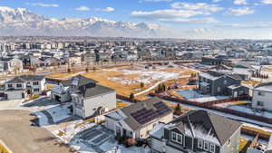 Snowy aerial view featuring a mountain view