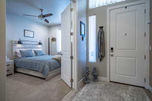 Front Office / On-Suite / 2nd Master Bedroom with ceiling fan, light hardwood / wood-style flooring, and a textured ceiling