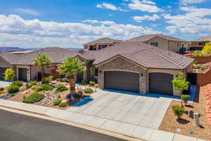 View of front of property with a garage