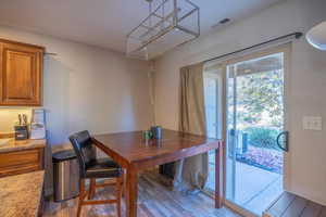 Dining room featuring wood-type flooring