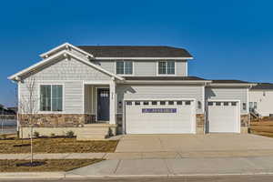 View of front of home with a garage